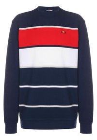 Pull bleu marine avec de larges rayures horizontales rouges et blanches ainsi qu'un petit logo orange et noir sur la poitrine.