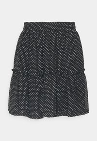 Černá vrstvená sukně vyrobená z lehkého materiálu s bílými puntíky, s elastickým páskem a volánkovým lemem.