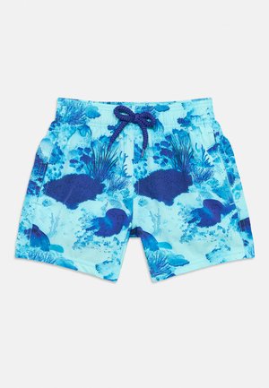 Μπλε μαγιό βερμούδα με σκούρα μπλε σχέδια κοραλλιών και μέδουσων, ελαστική μέση και σκούρα μπλε κορδονάκι δεμένο σε φιόγκο.