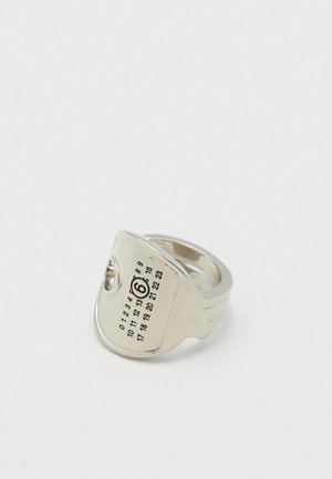 Silver adjustable ring featuring a calendar dial with numbers 0 to 23 and a circled number 6 on a plain white background.