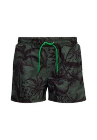 Costume da bagno verde con un motivo di foglie tropicali nere, vita elastica e cordoncino verde. Realizzato in materiale leggero e a rapida asciugatura.
