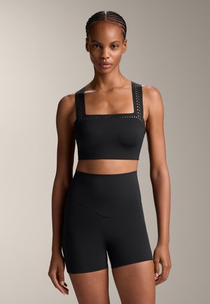 COMPRESSIVE CUTWORK - Linne - black