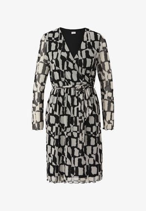 Sukienka o wzorze czarno-białym, zapinana w okolicy talii, z długimi rękawami, wykonana z miękkiego, przejrzystego materiału. Okrągły dekolt i lekko opływający fason.