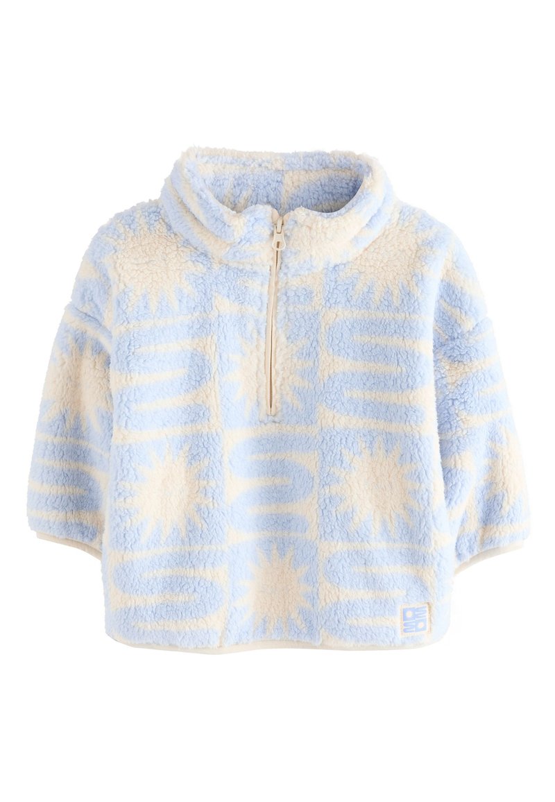 Fuzzy pullover in light blue and cream, featuring a half-zip collar and sunburst pattern, made of soft, textured fabric.