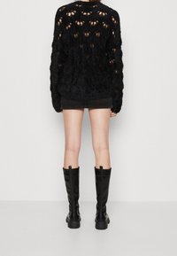 The Ragged Priest Sweter