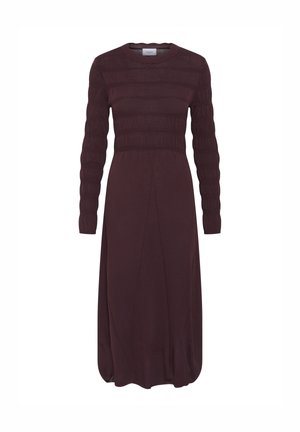 Knit dress in deep burgundy, featuring long sleeves, a ribbed bodice, and a flared hem. Smooth texture with subtle horizontal stripes.