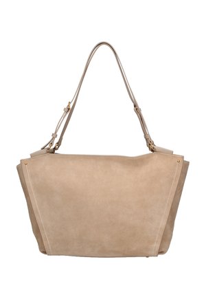 Beige suede tote bag with adjustable shoulder strap, trapezoid shape, visible stitching, and small gold-tone metal accents.