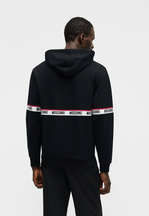 Moschino pantalon de jogging à logo appliqué - Noir dès 220,00 € - sur