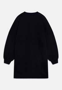 Černá oversize mikina s dlouhými balónovými rukávy, kulatým výstřihem a volným střihem. Vyrobena z měkké, elastické látky.