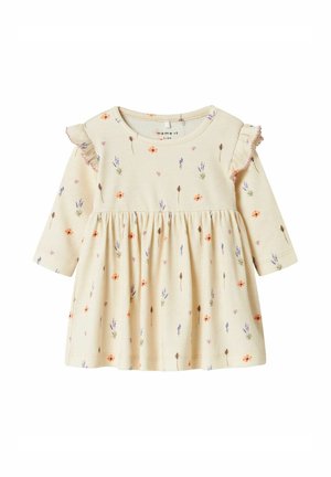Cremfarbene Kleid mit langen Ärmeln, gerafft Rock, florales Muster in Orange und Lavendel, gerippte Textur und Rüschenakzente an den Schultern.