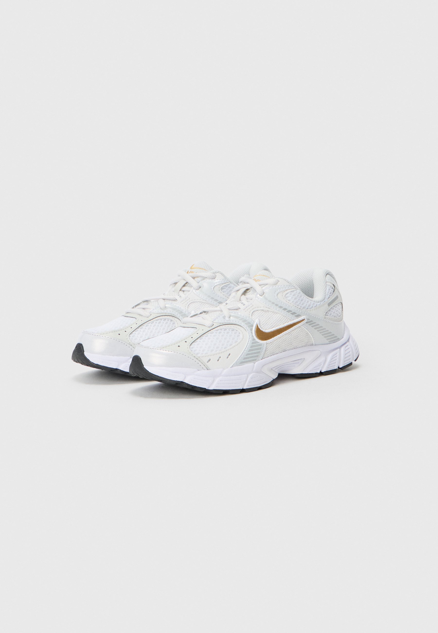 nike gold white