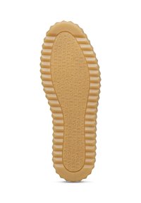 Rubber shoe sole with a textured, wavy design in beige, featuring repetitive embossed branding along the length for grip and style.