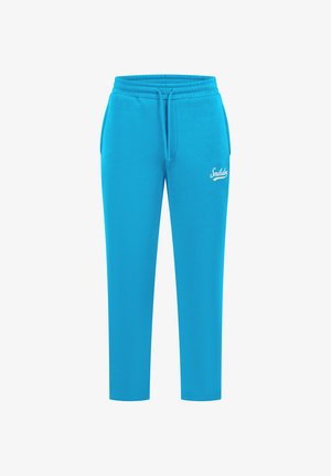Turkis sweatpants lavet af blødt materiale med elastisk talje, snor og sidelommer. Har et hvidt logo på låret.