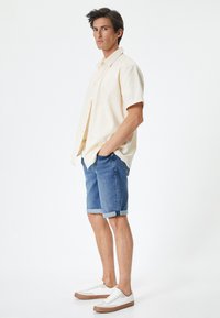Koton Farkkushortsit - blue denim