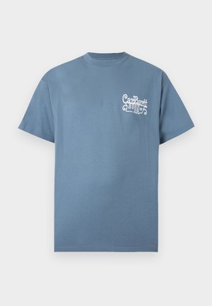 T-shirt bleu à manches courtes avec col rond et logo texte blanc stylisé "Carhartt WIP" sur la poitrine gauche.