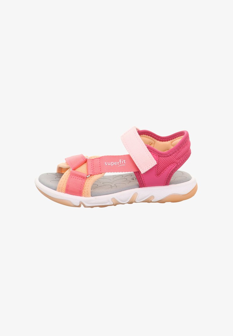 Sporty sandal featuring pink and coral straps, Velcro closures, and a textured gray insole. Lightweight white sole with flexible treads.