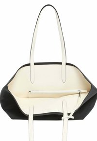 Borsa tote bianca e nera con design strutturato, dotata di un esterno nero texturizzato e un interno crema liscio, include una tasca zip.
