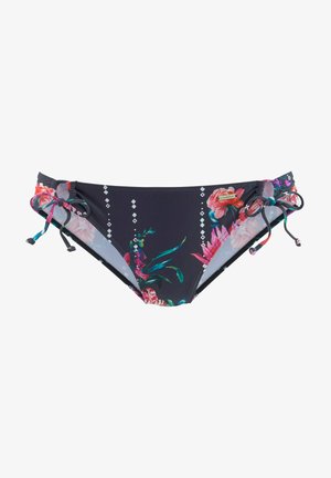 Parte inferior de bikini negra con estampado floral colorido y patrones de diamantes. Presenta lazos laterales y una textura que sugiere un tejido de baño elástico.