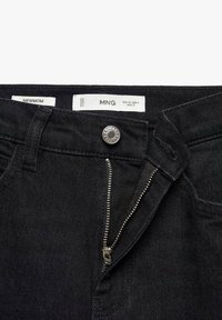 Black denim jeans with a zipper fly and metal button closure. Features a smooth texture, leather-like tags, and a classic five-pocket design.