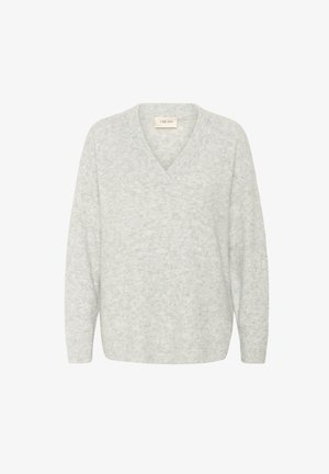 Šviesiai pilkas megztinis, pagamintas iš minkštos, tekstūruotos medžiagos. Turi gilų V formos kaklą ir ilgomis rankovėmis. Paprastas dizainas be raštų ar puošmenų.