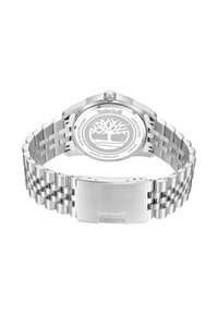 Orologio in acciaio inossidabile con bracciale a maglie, finitura lucida e cassa rotonda. Presenta un logo Timberland e un fondello resistente all'acqua.