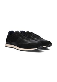 Zwarte sneakers van een mix van leer en suede materialen; uitgerust met een gevoerde zool, ronde neuzen en tonale veters. Subtiele designelementen.