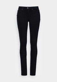 Vaqueros skinny negros con una textura de denim suave, dise�ño clásico de cinco bolsillos, trabillas para cinturón y un cierre de botón metálico sutil.