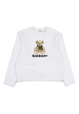 Felpa bianca con grafica di un orso che indossa una sciarpa nera e beige, con la scritta "BURBERRY" stampata sotto il design in testo nero.