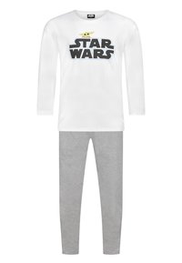 Camicia bianca a maniche lunghe con logo "STAR WARS" e grafica di Yoda; abbinata a pantaloni grigi. Materiale in cotone, design casual, forma aderente.