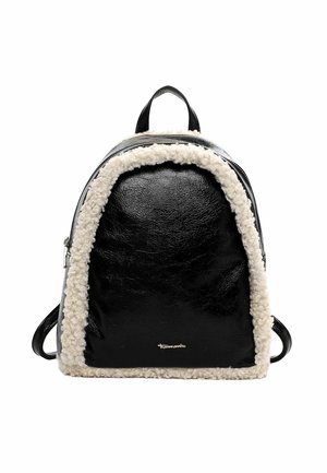Zaino nero in ecopelle con un bordo peloso bianco, forma rotonda e logo del marchio sottile nella parte inferiore. Doppie cinghie per il trasporto.
