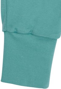 Tékle kleurige katoenen sweatshirtmanchet met ribbelstructuur, voorzien van een lichte plooival bij de naad voor extra rek en comfort.
