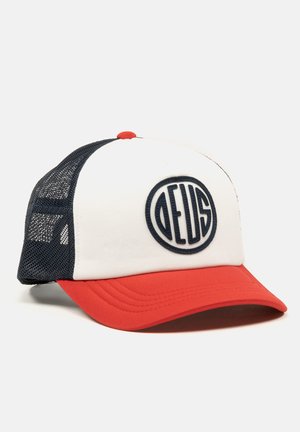 White and red baseball cap with a navy mesh back, featuring a circular navy logo on the front and a curved brim.