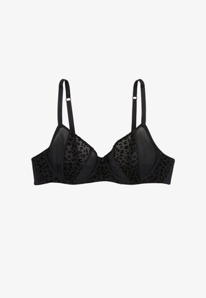 Soutien-gorge noir avec des bonnets en maille transparente à motif léopard, des bretelles réglables, un soutien-gorge à armatures et un détail nœud à l'avant. Tissu lisse avec des accents texturés.