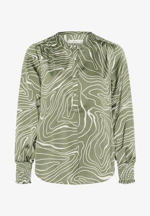 Zelena bluza z dolgimi rokavi iz mehkega blaga, ki ima bele valovite črte in gumbno zapiranje spredaj. Naborki na rokavih z elastiko.