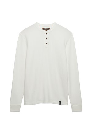 Witte lange mouwen henley shirt van zachte stof, met een ronde halslijn, drie bruine knopen en een logolabel aan de zoom.