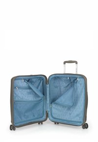 Valigia rigida grigia con un interno a motivo triangolare blu. Presenta diversi scomparti con zip e un manico retrattile.