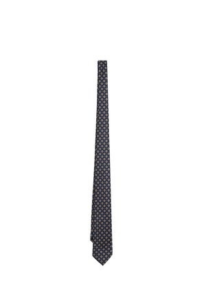 Corbata azul marino con un patrón repetitivo de pequeños diseños florales circulares en naranja y blanco.