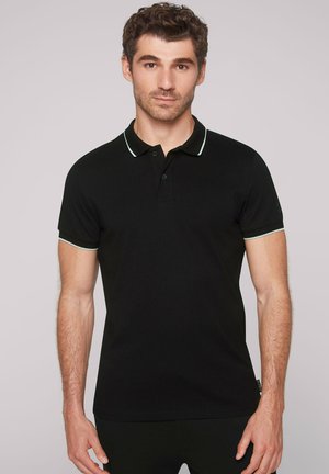 MIT TAPES UND BACKPRINT - Polo shirt - true black