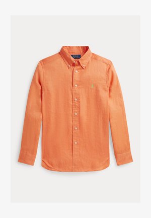 Pomarańczowa koszula z długim rękawem zapinana na guziki, z kołnierzykiem, delikatną fakturą i małym zielonym logo na piersi.