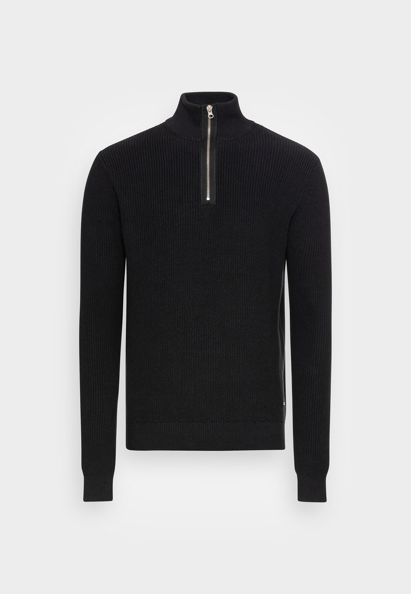 Pull noir en maille avec manches longues, texture côtelée et col demi-zip argenté sur un fond clair uni.