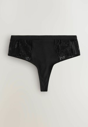 Mustat pitsiset ja kankaiset stringit, joissa on kukkakuvioiset pitsimäiset paneelit sivuilla, sileä keskikangas ja minimaalinen peitto. Litteä vyötärönauha.