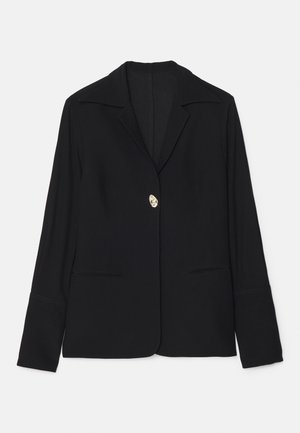 Black blazer with a notched collar, single gold button closure, two front pockets, and long sleeves with a smooth texture.