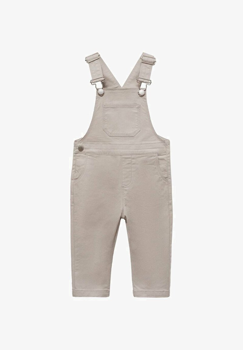 Béžové bavlněné lacláče s nastavitelnými popruhy, přední kapsou a dvěma bočními kapsami. Hladká textura a přiléhavý střih, zúžené nohavice.