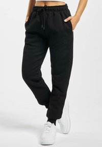 DEF LOLA - Verryttelyhousut - black