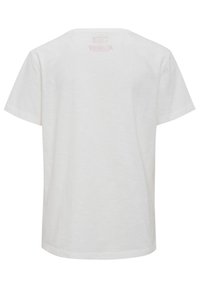 Hvid bomulds T-shirt med rund hals, korte ærmer og en let struktureret overflade. Bagsiden har en diskret logo detalje ved halsen.