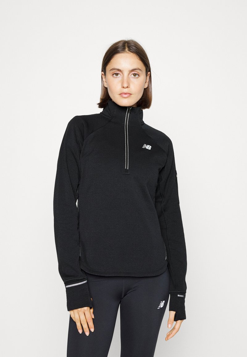 New Balance HEAT GRID HALF ZIP Fleece jumper black Zalando.ie
