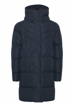 Cappotto puffo blu navy con colletto alto, chiusura frontale a zip e due tasche sul petto con zip. Presenta una texture trapuntata orizzontale.