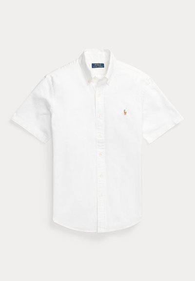 Fehér, rövid ujjú, gombos ing gallérral és hímzett Polo Ralph Lauren logóval a bal mellrészen.