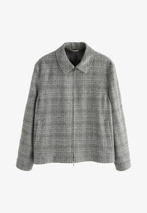 Grau karierter Blazer mit einem Kragenhals, Frontreißverschluss und zwei Seitentaschen. Hergestellt aus strukturiertem Stoff, mit einer kastigen Form.