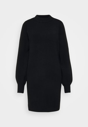 Must have varrukad, must kudum dresses, kõrge ümar kaelus ja pluusitaolised varrukad. Pehme tekstuur ja keskpikk disain.